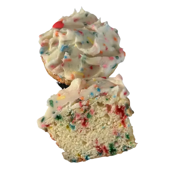 Cupcake with colorful sprinkles and frosting.